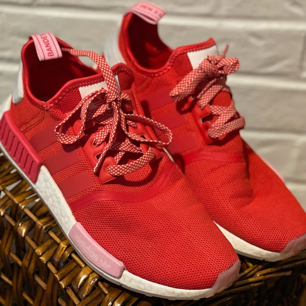 Red and pink adidas sneakers